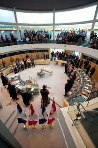 Everyone is on their feet during the historic devolution signing in Yellowknife in March.