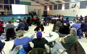 A full house of community members in Fort Chip take part in last Thursday evening’s feast and presentation to hear the preliminary results of an ongoing community-based health and wild food study.