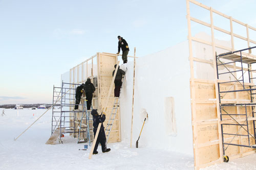 A crew of dedicated festival workers set up frames for castle walls on a frosty Jan. 14. Work started at the crack of the new year. (Photo: Don Jaque)