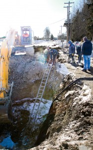 In addition to trying to repair old brittle pipes in cold weather and dealing with chunks of frozen ground, crews down in the excavation were dealing with mud as the flow of water mixed with the silt. That meant constantly pumping out the gritty mess and hauling it away by the truckload.