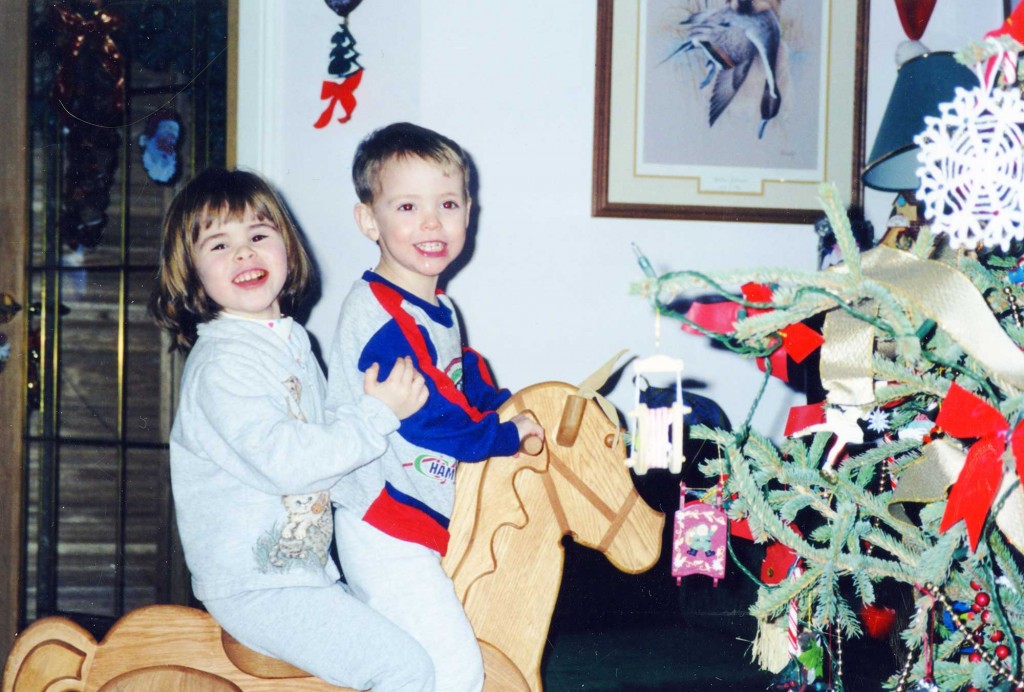 Megan and Matthew Walsh test out a rocking horse during the holiday season in 2000. Families were encouraged to share their best Christmas snaps with the museum.